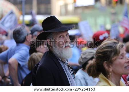 NEW YORK CITY - JULY 22 2015: thousands rallied in Times Square to oppose the President\'s proposed nuclear deal with Iran. Hasidic Jew at rally in Times Square.