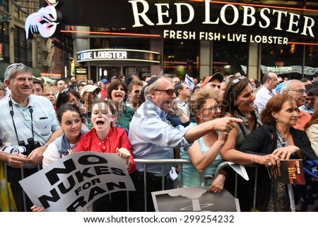 NEW YORK CITY - JULY 22 2015: thousands rallied in Times Square to oppose the President's proposed nuclear deal with Iran. Rally attendees denounce anti-zionist Neturei Karta in Times Square