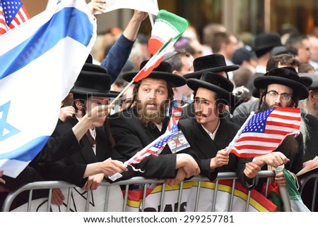 NEW YORK CITY - JULY 22 2015: thousands rallied in Times Square to oppose the President\'s proposed nuclear deal with Iran. Anti-zionist Neturei Karta members