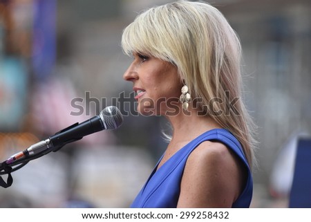 NEW YORK CITY - JULY 22 2015: thousands rallied in Times Square to oppose the President\'s proposed nuclear deal with Iran. Fox News commentator Monica Crowley