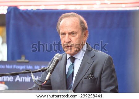 NEW YORK CITY - JULY 22 2015: thousands rallied in Times Square to oppose the President\'s proposed nuclear deal with Iran. US New & World Report publisher Mortimer Zuckerman