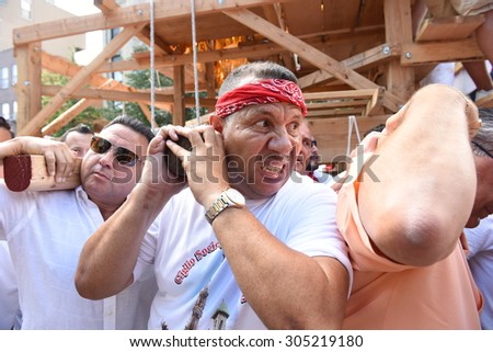 NEW YORK CITY - AUGUST 9 2015: the Giglio Society of East Harlem held it annual street fair & giglio lift on Pleasant Ave in the parish of Our Lady of Mount Carmel..