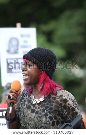 NEW YORK CITY - AUGUST 26 2015: the International Women's Day Coalition staged a rally in Union Square featuring speakers of issues of concern to women as well as activists on behalf of Ayotzinapa.