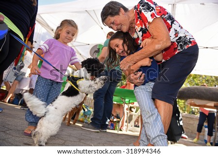 NEW YORK CITY - SEPTEMBER 20 2015: Adoptapalooza in Union Square Park brought numerous animal rescue organizations together under the big tent of the Mayor\'s Alliance for NYC Animals.