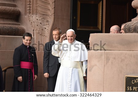PHILADELPHIA, PA - SEPTEMBER 26 2015: Pope Francis arrived at the Cathedral Basilica of Peter and Paul in downtown Philadelphia to celebrate mass. Pope Francis waves to the devout