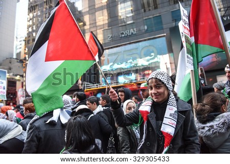NEW YORK CITY - OCTOBER 18 2015: several hundred people gathered in Times Square to demonstrate for the Palestinian people & denounce Israeli & US policies in the mideast