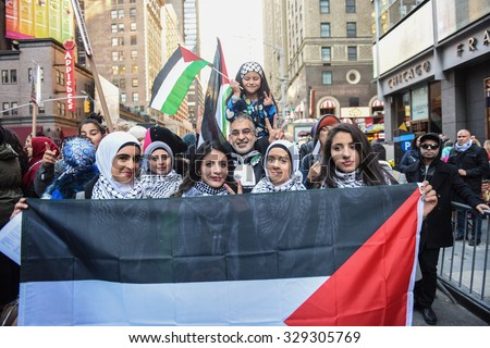 NEW YORK CITY - OCTOBER 18 2015: several hundred people gathered in Times Square to demonstrate for the Palestinian people & denounce Israeli & US policies in the mideast