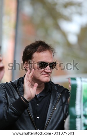 NEW YORK CITY - OCTOBER 24 2015: More than one thousand activists marched on behalf of the families of victims of alleged police brutality in #RiseUpOctober. Filmmaker Quentin Tarantino on stage