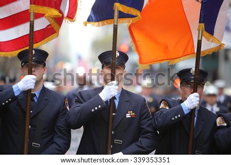 NEW YORK CITY - NOVEMBER 11 2015: New York City\'s Veterans Day was led by the US navy & grand marshal & world war two naval veteran Robert Morgenthau. FDNY honor guard