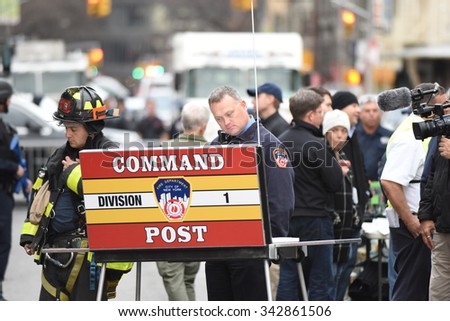 NEW YORK CITY - NOVEMBER 22 2015: Emergency response personnel staged an active shooter exercise in Manhattan\'s Lower East Side. Temporary command post