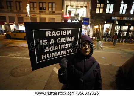 NEW YORK CITY - DECEMBER 30 2015: Several hundred activists gathered in Union Square for a candlelight vigil in memory of Sandra Bland, arrested for a minor traffic violation later found hanged.