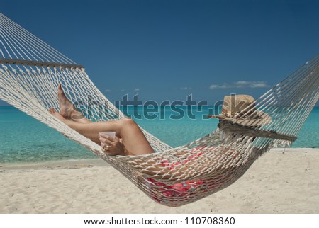 woman in hammock at Hawks Nest resort in Cat Island Bahamas