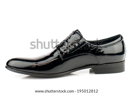 Black man patent leather shoe  with shoelaces on white background.