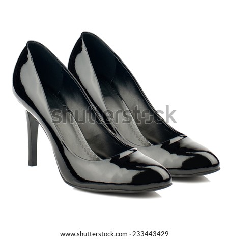 Black patent high heel women shoes isolated on white.