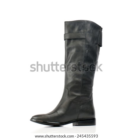 Black knee high boot isolated on white background.