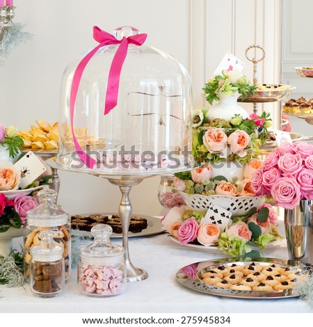 Flowers and cookies in home interior.