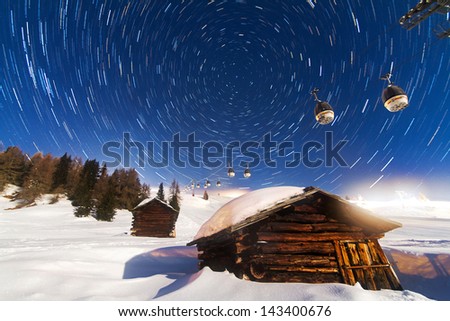 Beautiful long exposure star trail looking towards Polaris in the Italian alps