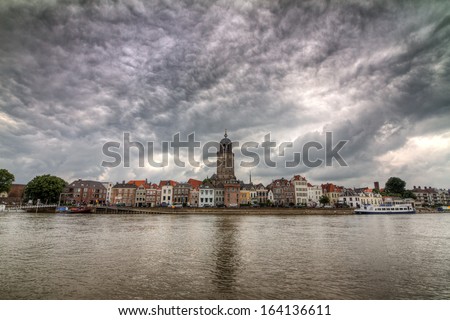 Beautiful cityscape of the city of Deventer in the Netherlands, seen from across the river IJssel