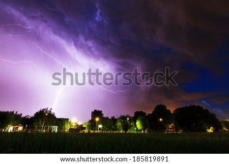 Beautiful big flash of lightning in the night sky over Baambrugge in the Netherlands