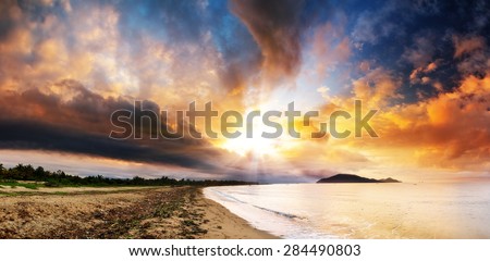 Beautiful panorama of the coastline of Maroantsetra in Madagascar at sunrise, with a dramatic sky and cloudscape