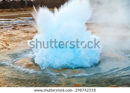 The Strokkur Geyser erupting at the Haukadalur geothermal area, part of the golden circle route, in Iceland