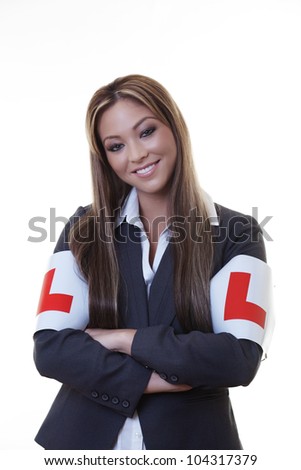 woman wearing arm bands with the letter L as if she is still learning something at work