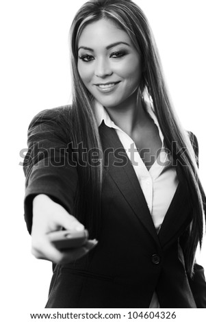 woman holding a TV remote control know what buttons to press and being in control at work