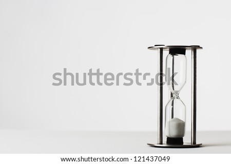 sand timer shot on white background in the studio