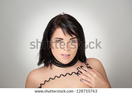 portrait of sexy woman with telephone cord wrapped around her neck