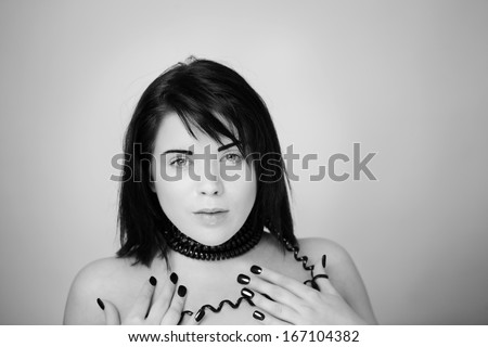 portrait of sexy woman with telephone cord wrapped around her neck