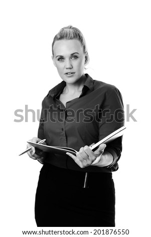 standing business woman working and checking or making note in a large note pad