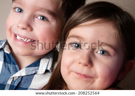 natural portrait of a young boy and girl
