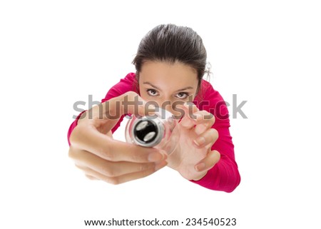 woman changing a light bulb shot from a birds eye  view looking down