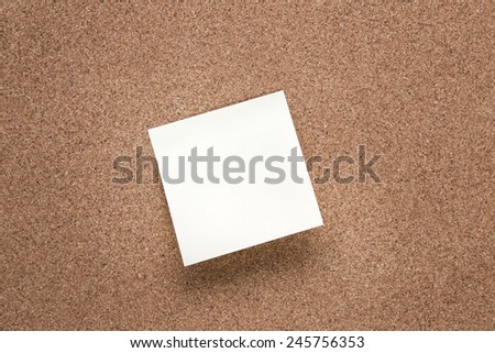 plain cork pin board with post it notes stuck to it