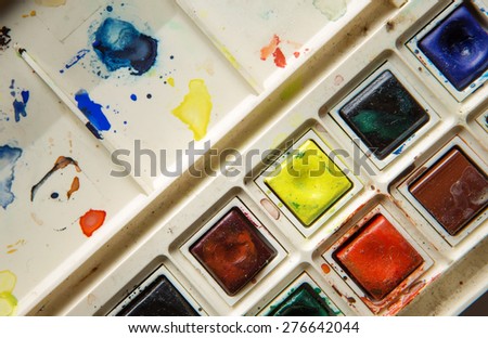 old well used artist watercolor paints set