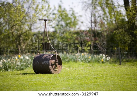 still life image garden lawn roller with at lot of hard work you to can have a nice flat lawn!