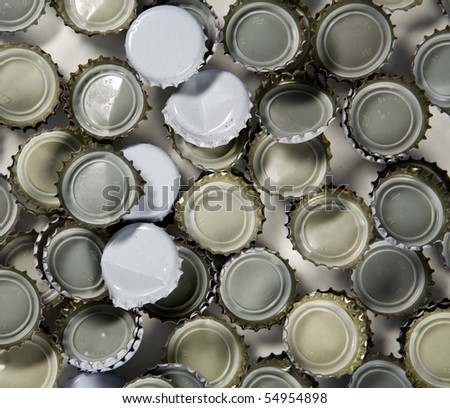 stock back ground image of metal bottle tops