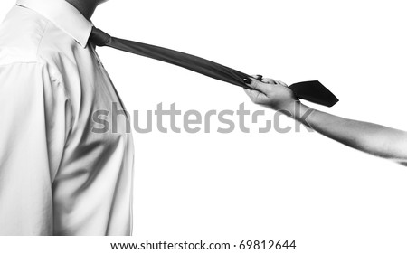close up of womans hands pulling on a mans tie
