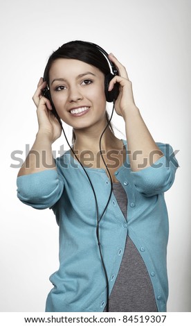 stock photo woman wearing headphones listening to music