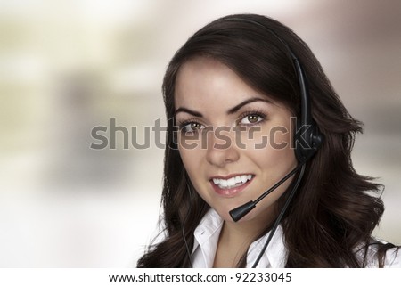 young pretty woman wearing a headset talking to someone