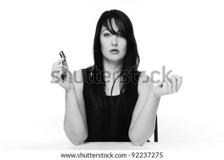 woman holding a razor blade