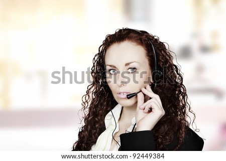 woman looking like she works in a call center