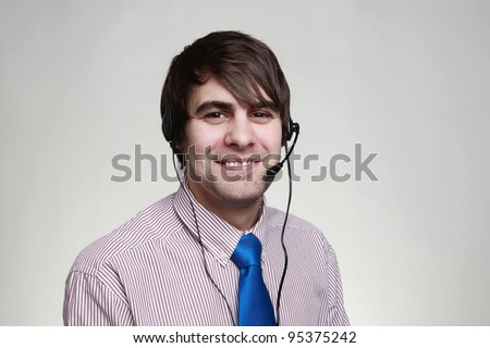 happy man with a headset on cant wait to hear from you