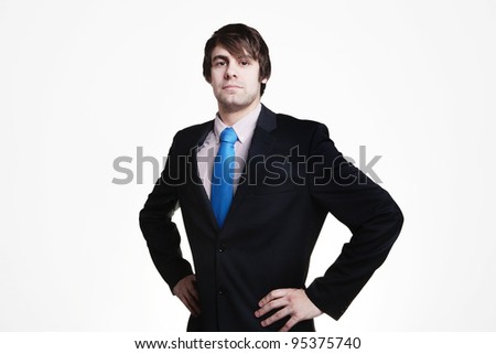 businessman looking doing a superman pose