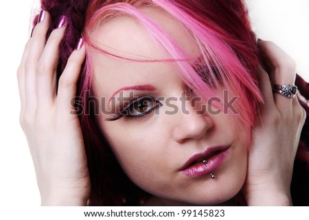 woman with dread lock hair looking at camera