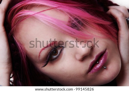 woman with dread lock hair looking at camera
