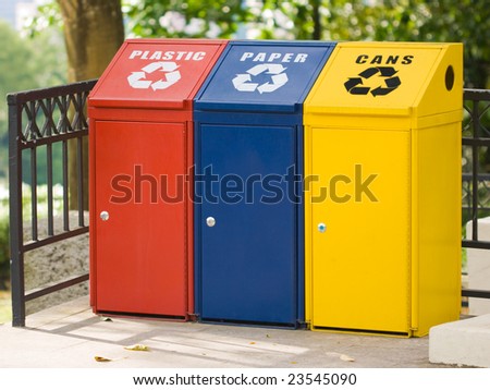 Three recycling bin for cans, plastic and paper. Environmental protection