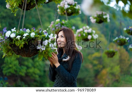 Beautiful south east asian girl and flowers