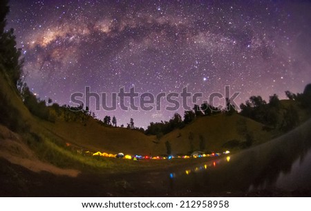 Milky way galaxy with stars and space dust in the universe. Ranu Kumbolo, Semeru Mountain , East Java, Indonesia. Semeru Mountain also known as Mahameru Mountain in Indonesia means the great mountain.