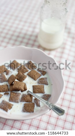 Crispy cereal and chocolate pillows with milk